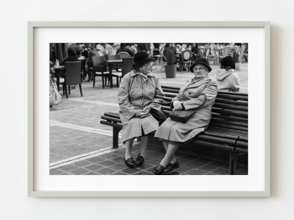 Romanian ladies sitting on a bench | Wall Art Online now