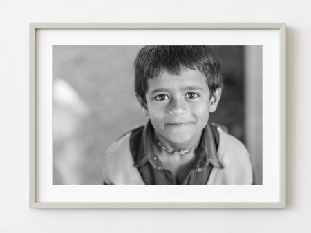 Young boy at school in Odanadi | Wall Art Sale