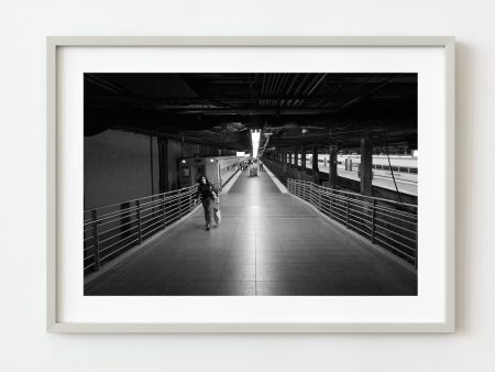 Woman walking up train station ramp New York | Wall Art Sale