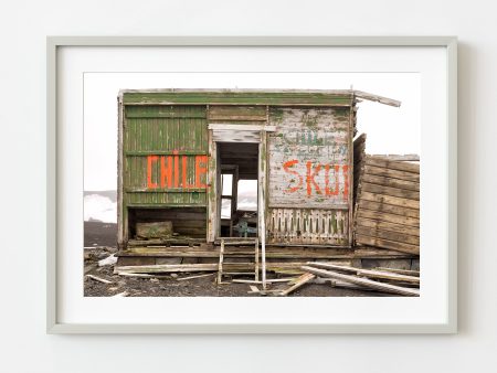 Wooden building with the word Chile at Whalers Bay Station Antarctica | Wall Art Online now