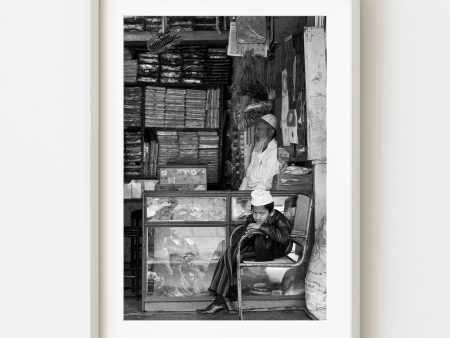 Young Muslim boy sitting in fathers shop bored India | Wall Art Hot on Sale